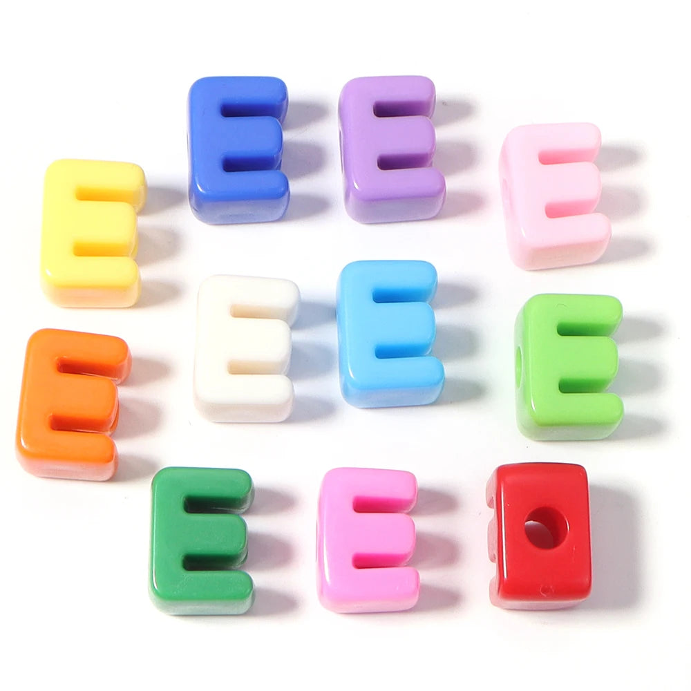 A collection of colorful acrylic letter E beads in various shades including blue, purple, pink, yellow, and green.