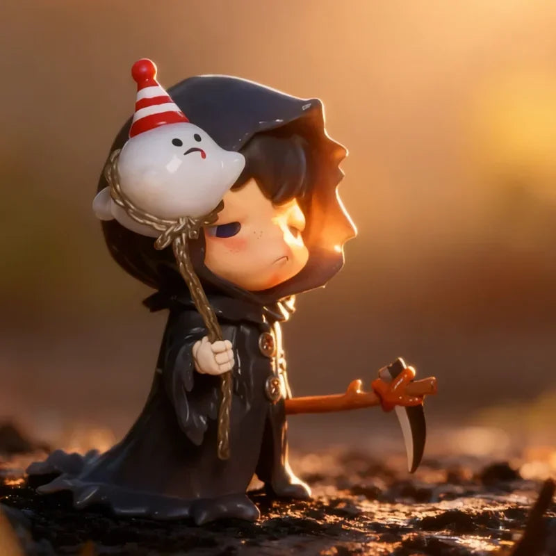 A collectible figure of a dark-haired monster with a white, conical hat and a knife, set against a warm, golden background.