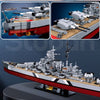 A detailed model kit of the Bismarck Battleship featuring a 2-in-1 construction and various scale views.