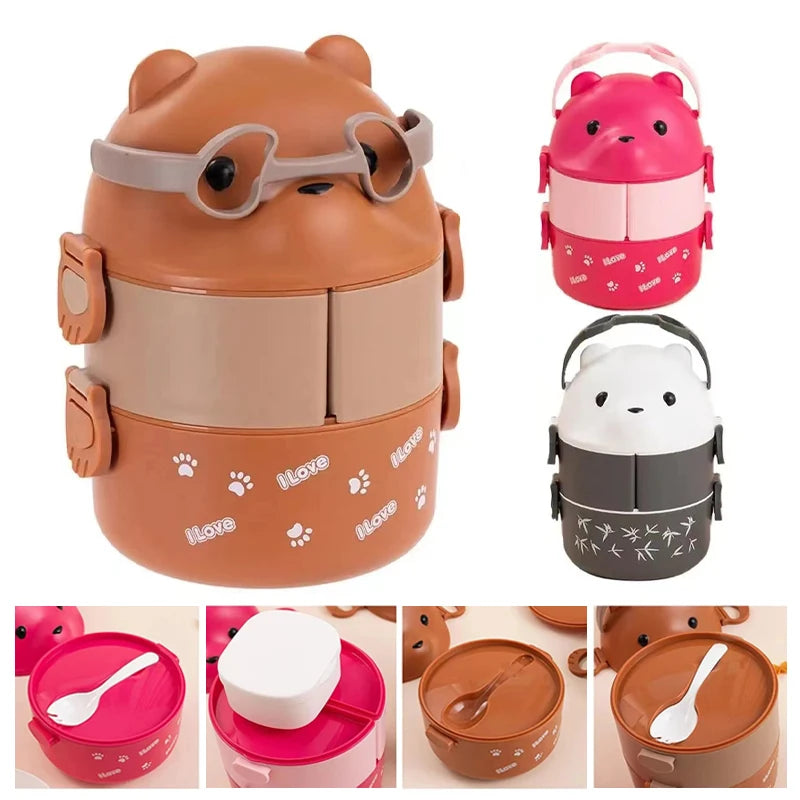 A stack of adorable bear-shaped eyeglasses lunch boxes in pink, beige, and gray colors.