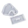 White silicone resin molds shaped like a heart and a rectangular frame for DIY craft gifts