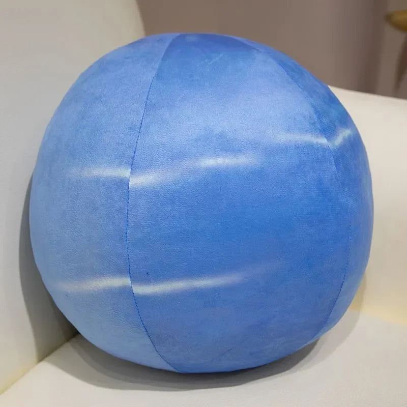 A round, light blue plush toy with white stripes, used as an educational soft doll.
