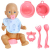 A set of pink and blue feeding accessories for a doll, including a bowl, plate, spoon, and bib.