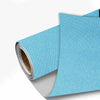 A roll of light blue linen book binding cloth used for albums and scrapbooks.