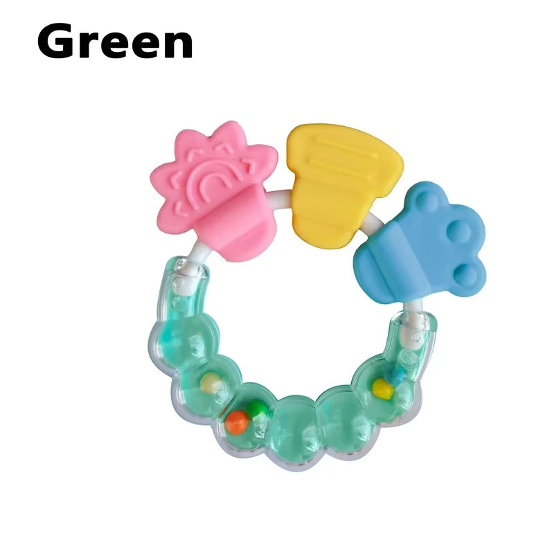 A silicone baby teether with pink and yellow shapes for soothing gums.