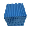 A stack of blue acoustic foam panels with a ribbed texture.