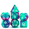 A set of seven glitter translucent polyhedral dice in various colors and shapes