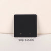 A black square jewelry display card with two holes, labeled 50p 5x5cm.