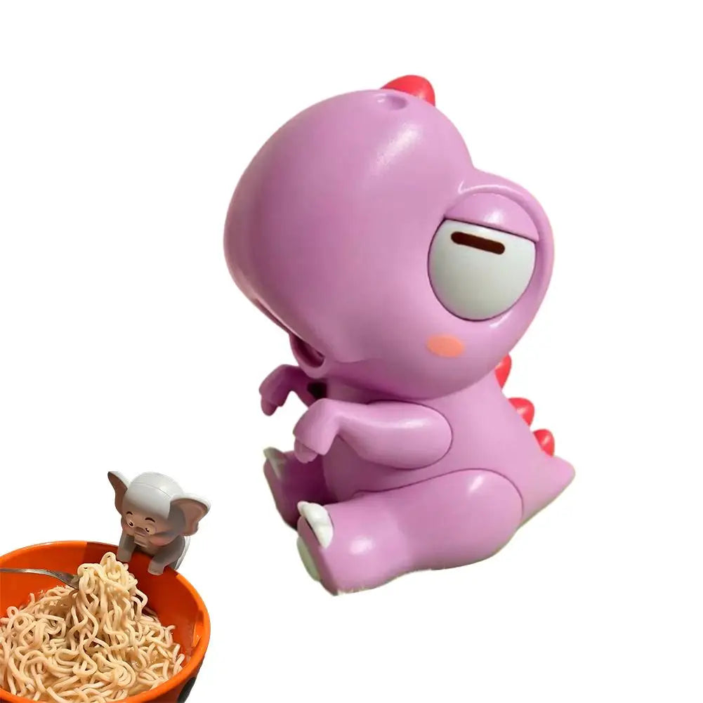 A small purple elephant-shaped product for hands-free baby feeding.