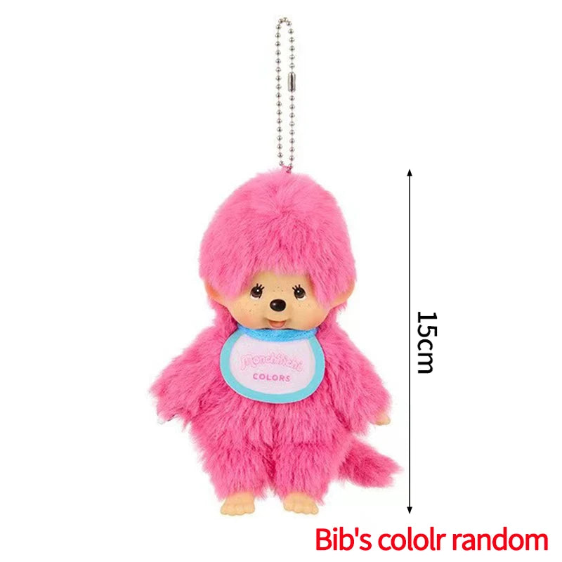 Pink Monchhichi plush keychain with a silver chain and a tag that reads Colors