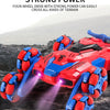 Red front wheel swing arm strong power four-wheel drive stunt car in rugged terrain