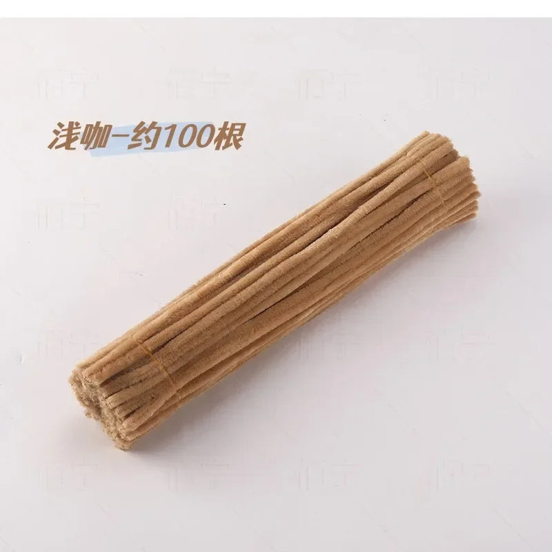 A bundle of natural brown chenille craft stems used for various projects.