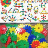 A collection of colorful snowflake building blocks in various shapes and colors.