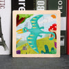 A wooden jigsaw puzzle featuring a green bird and colorful nature elements on a light background.