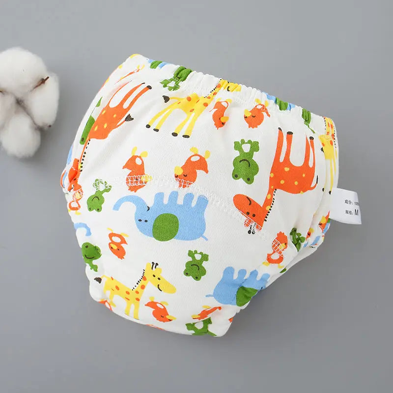 Paquete de pantalones de entrenamiento de paño coloridos con diseños de animales para bebés.