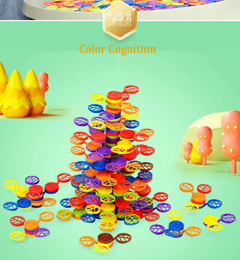 A colorful rainbow balance tree stacking block set with various colored rings and discs.