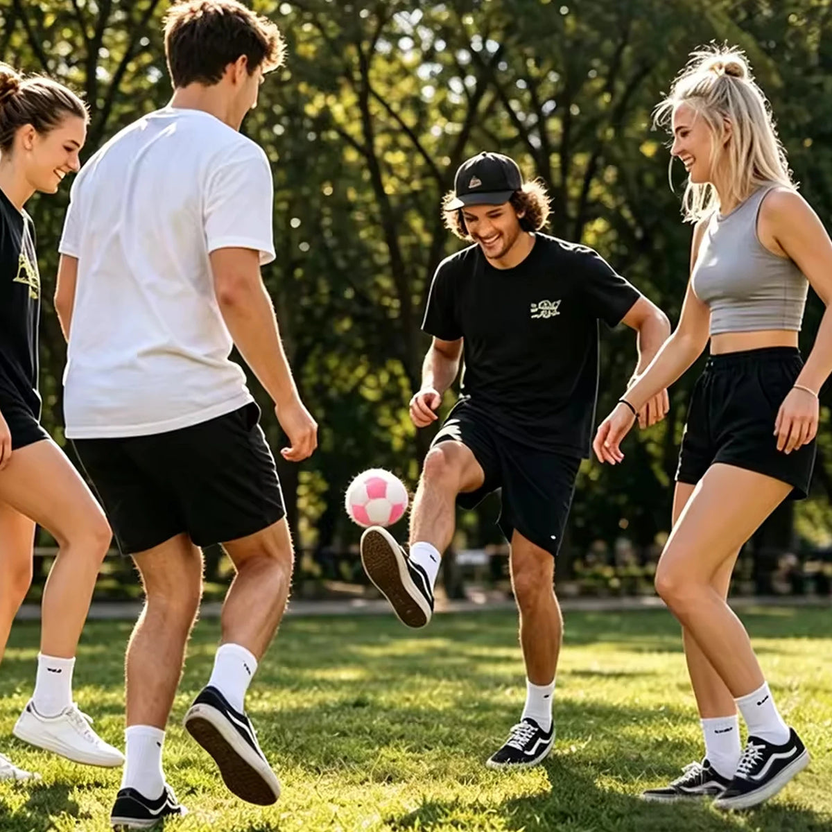 Three young people are playing soccer outdoors with a set of handmade crochet hacky sack balls.