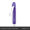 A purple transparent sequin crochet hook with a 25mm size marked on the side.