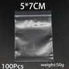 A clear resealable plastic bag containing 100 pieces of small items, with a weight of 50 grams.