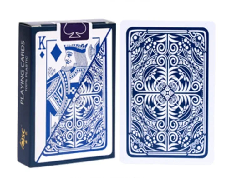 A box of blue and white playing cards featuring a king design and a decorative card.