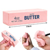 A pink butter squishy toy is shown in various forms, including a rectangular block and a finger-shaped item.