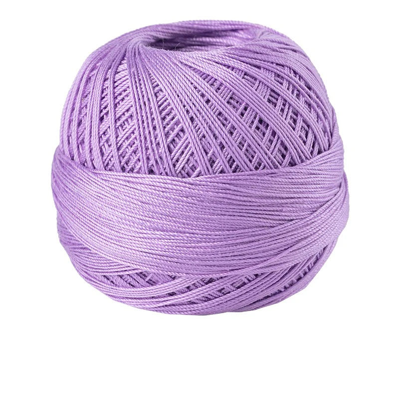 A ball of purple 100% cotton crochet thread used for tatting and embroidery.
