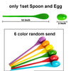 A set of six colored spoons and eggs for a game, showing various colors like purple, orange, yellow, green, red, and blue.