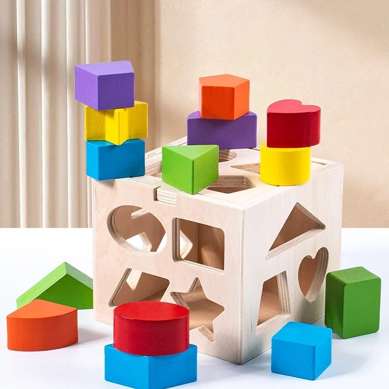 A wooden Montessori toy set featuring colorful blocks and geometric shapes arranged on a light wooden base.