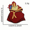 A red iron-on patch featuring a cartoon character design with blue and yellow accents.