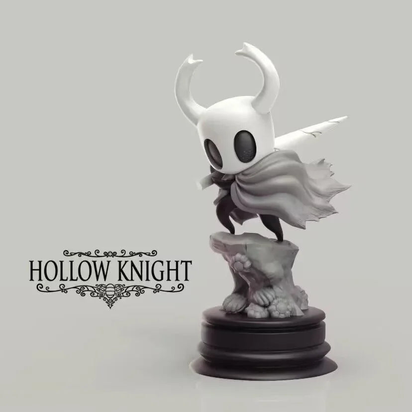 A white Hollow Knight Little Knight handcrafted PVC figure statue with a flowing cape on a black base.