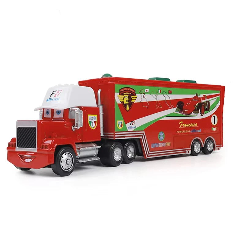 A red and green diecast toy hauler truck modeled after a Disney Pixar Cars 3 vehicle.