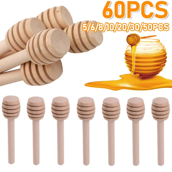 60 pieces of mini wooden honey dipper sticks in various sizes and a large golden honey dipper