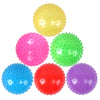A set of three inflatable sensory balls in yellow, pink, red, and purple.