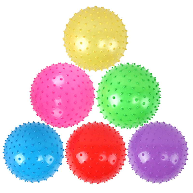A set of three inflatable sensory balls in yellow, pink, red, and purple.