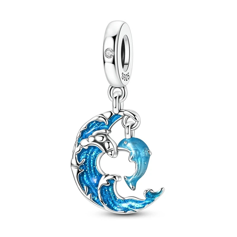 Sterling silver charm pendant set featuring starfish, sea turtle, and whale shark silhouettes