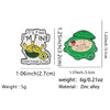 A set of enamel pins featuring a cute green turtle design with the text It's Fine I'm Fine Everything is Fine