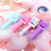 A collection of pink and purple detachable diamond painting rollers are displayed on a pink and white background.