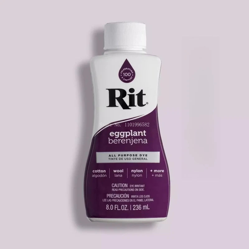 Bottle of Rit eggplant dye liquid with a white cap and purple liquid inside