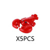 Five red marine animal building blocks including a shark, octopus, and whale