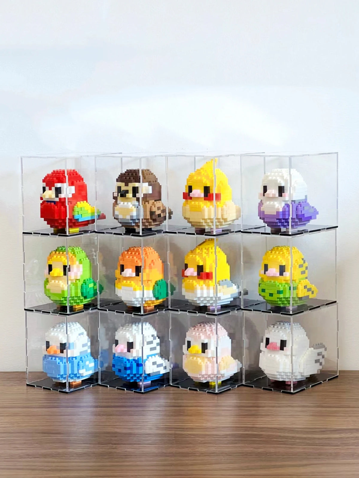A display of colorful parrot micro building blocks in various shades and colors arranged in a grid.