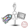Sterling silver charm beads set featuring cross, angel, and evil eye designs for DIY jewelry making