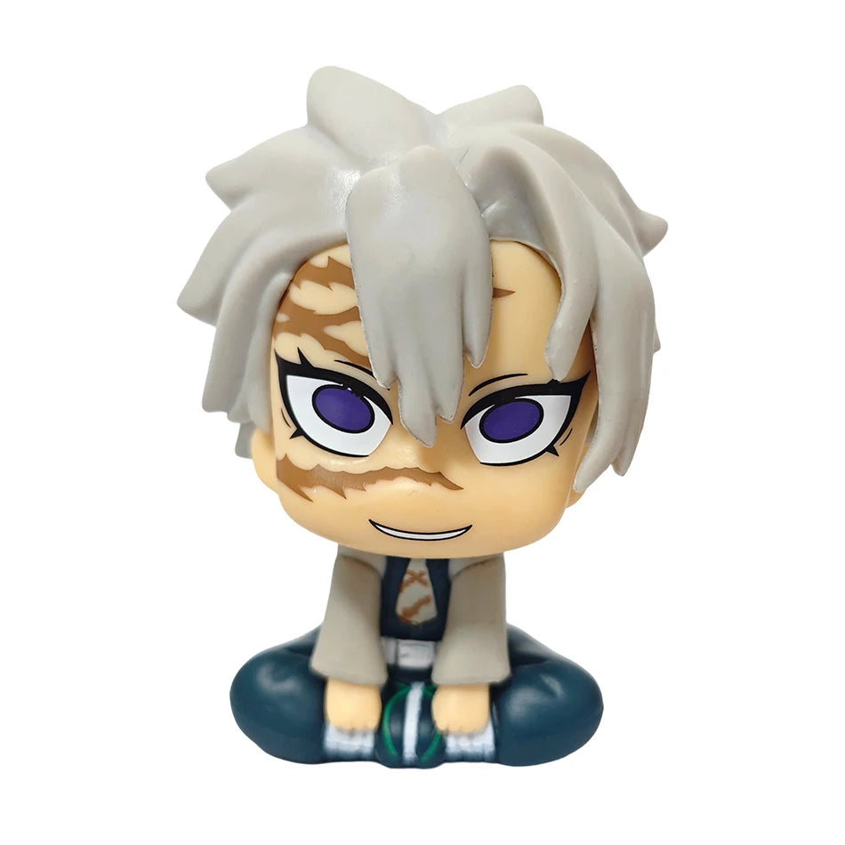 Action figure of the Demon Slayer character Tanjirou with white hair and orange markings.