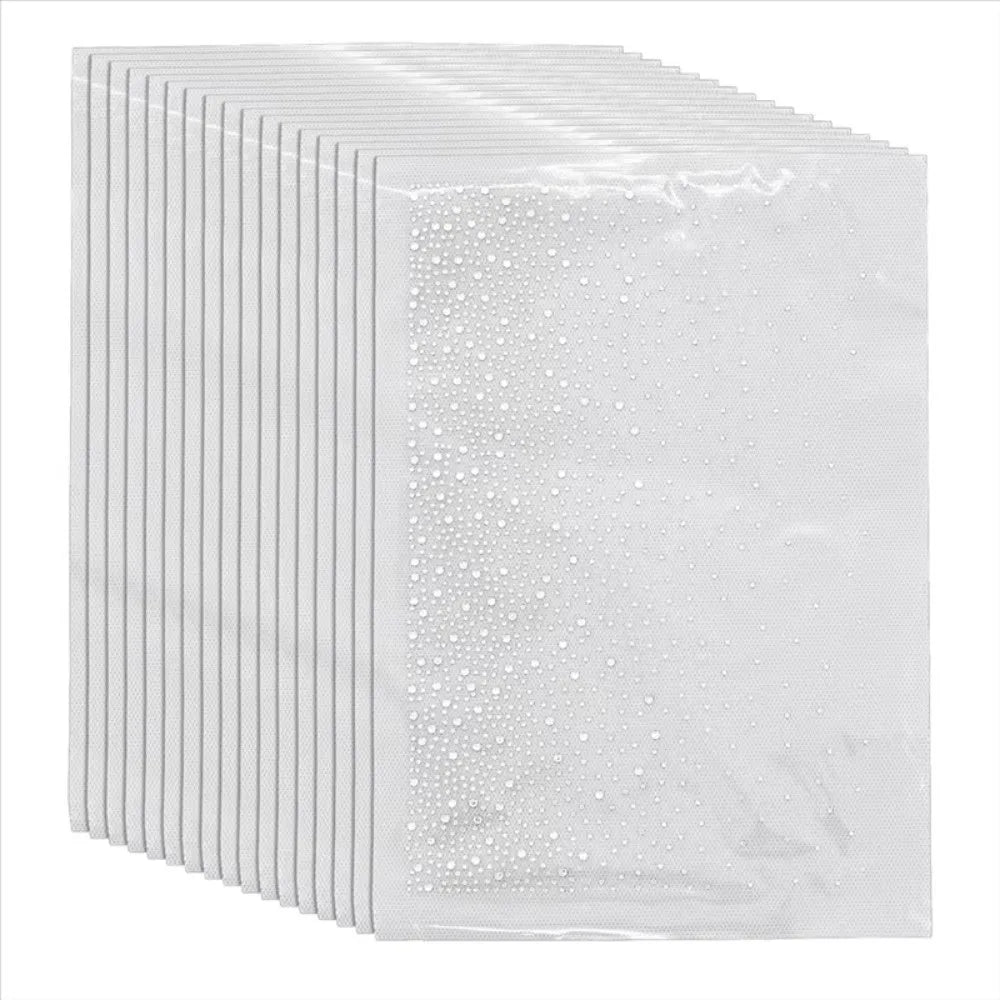 A stack of five clear sheets of gradient polka dot rhinestone stickers