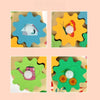 Four images showing a wooden busy board with musical activities featuring a house, a bee, and fruit on colorful backgrounds.