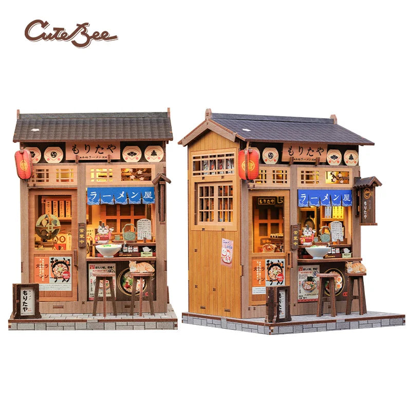 A detailed 3D wooden book nook kit featuring a traditional Japanese shop facade with LED lighting.