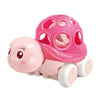 A pink soft rubber push and go friction car toy set with a shell design.