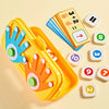A yellow Montessori finger counting math toy with colorful fingers and number cards is shown on a light background.