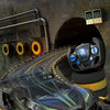 A black remote control drift racing car is shown driving on a track, with a controller visible nearby.