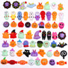 A collection of colorful Halloween squishies and stress relief toys featuring various shapes and characters.