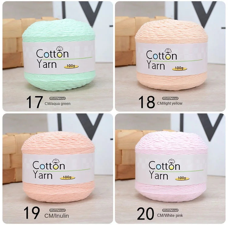 A set of twenty spools of 100g cotton yarn in various colors including aqua green, light yellow, and pink.